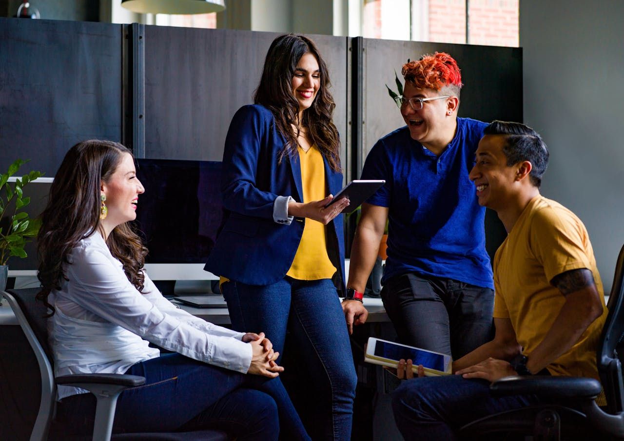 A group of diverse people working together in an inclusive office.